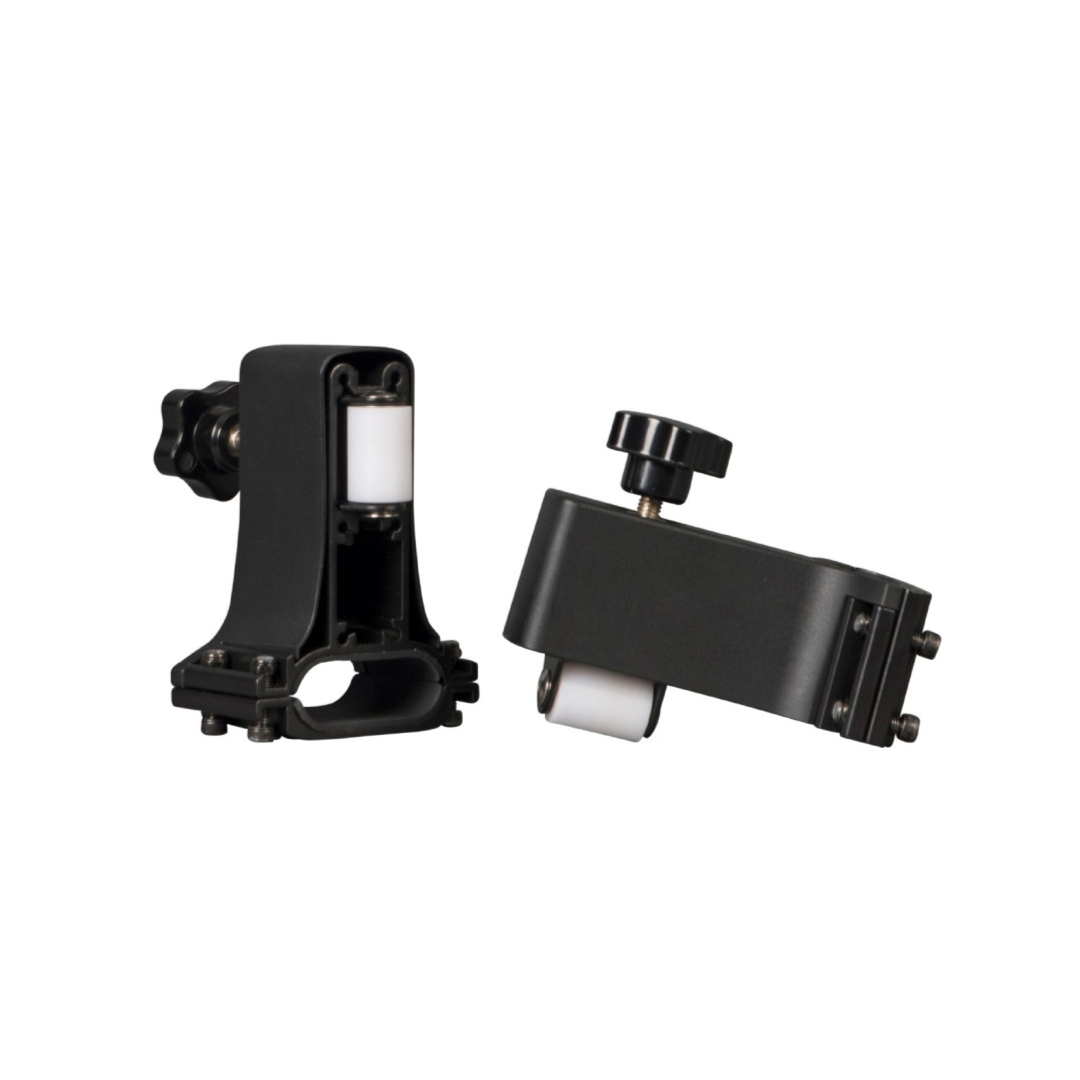 Two black mounting brackets from the Rollz Motion Rollator Accessories sit on a white background; one upright with an adjustable knob, and the other lies on its side showing attachment points. Both have smooth surfaces and white roller components.